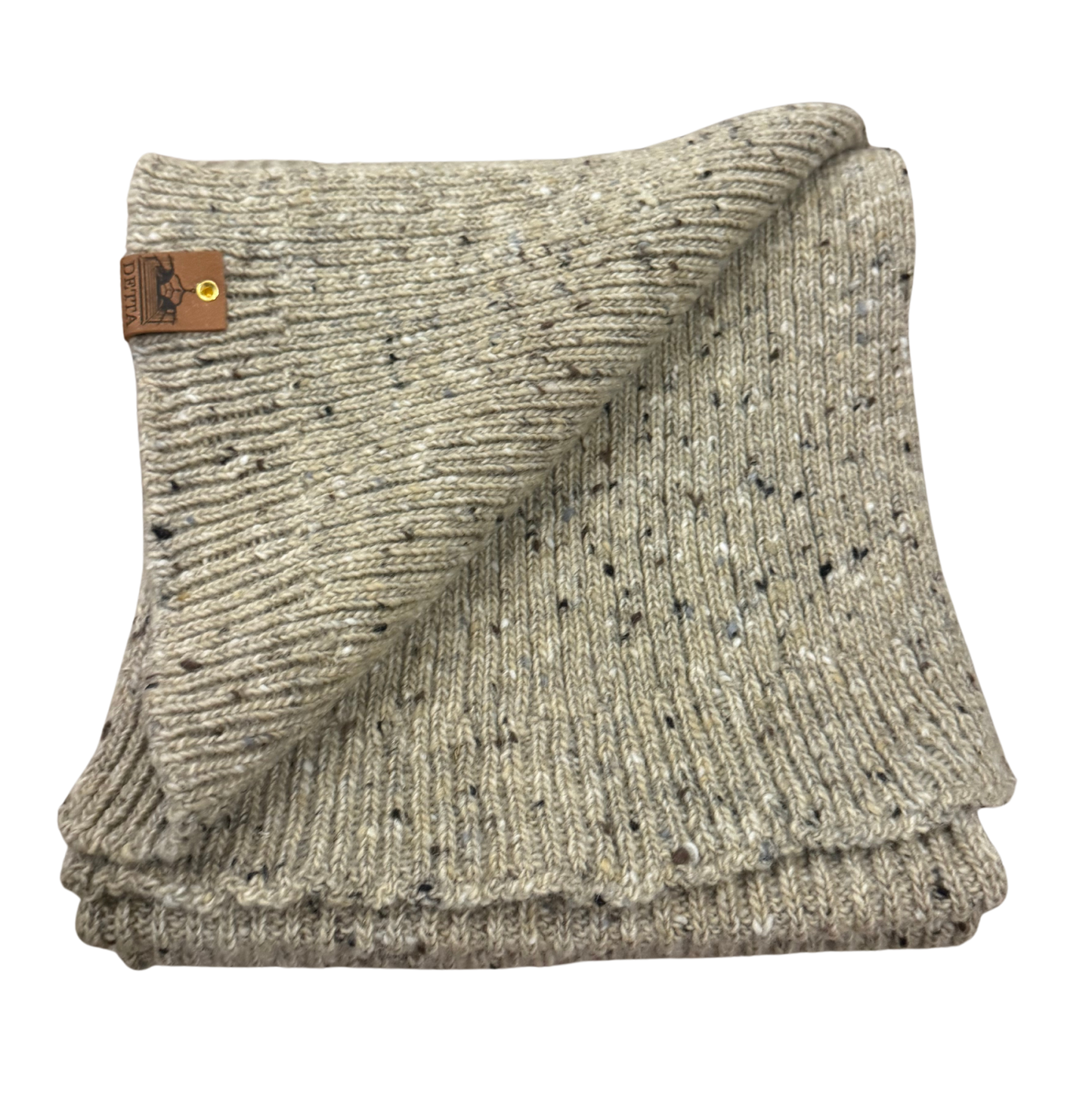 folded knitted oatmeal scarf from donegal tweed yarns